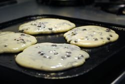 Lemon Blueberry Pancakes on Griddle